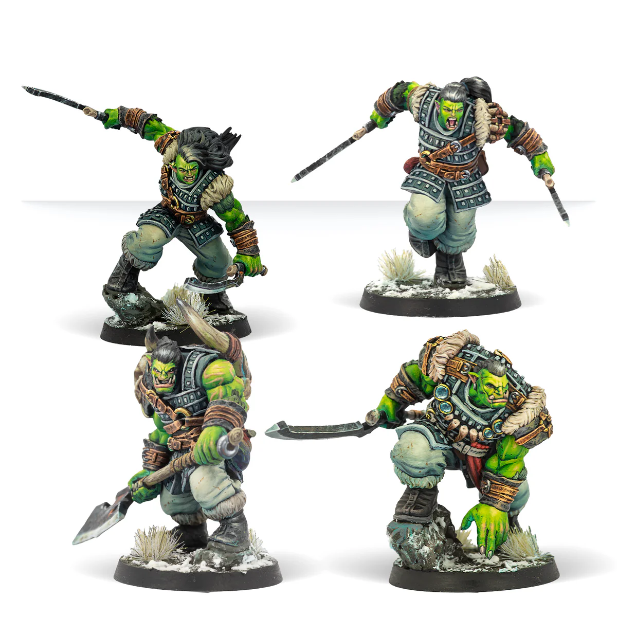 four painted orc miniatures