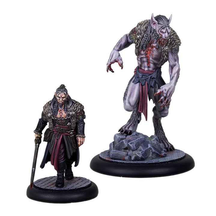 man with sword and werewolf painted miniatures