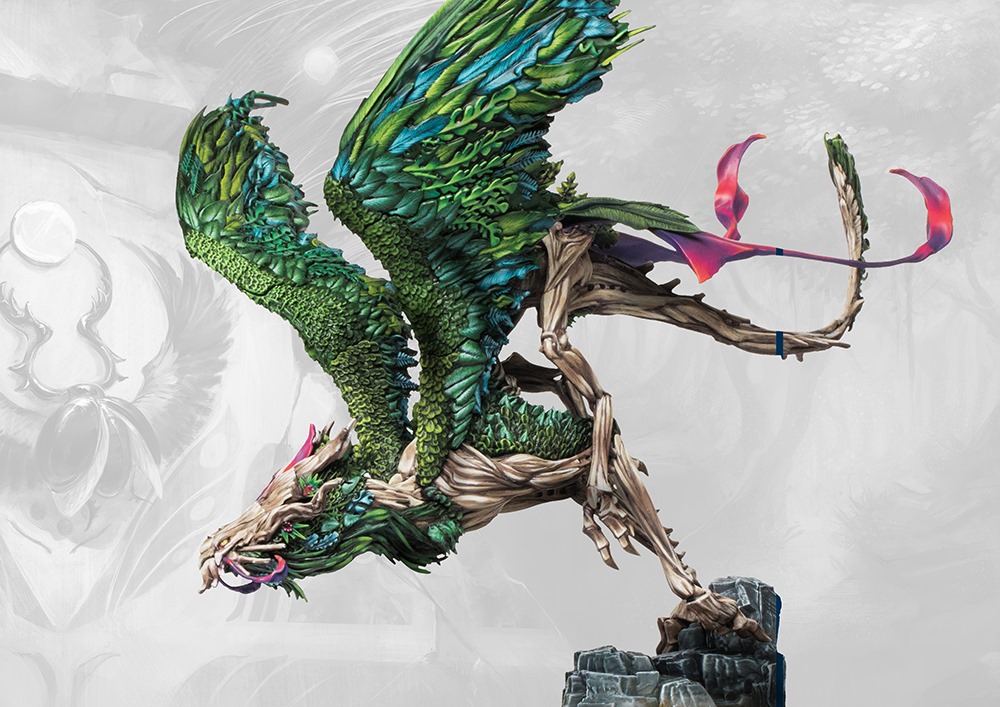 painted dragon made of wood and leaves