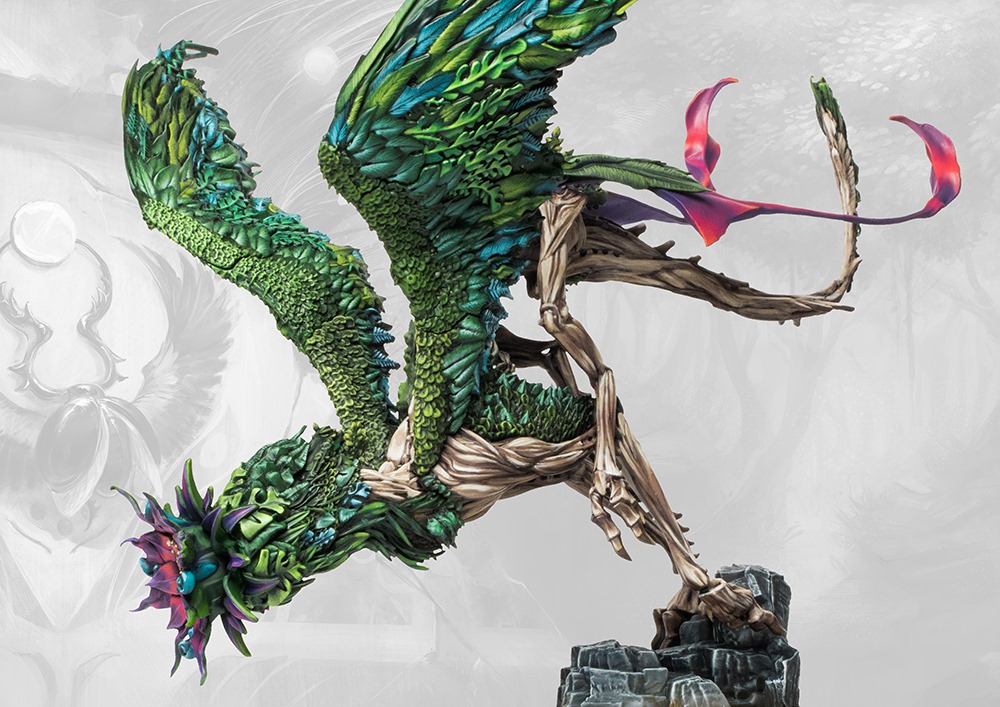 painted dragon made of wood and leaves with a flower for a head