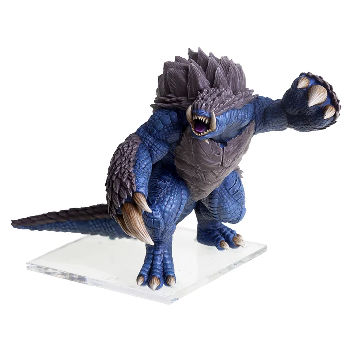 painted miniature blue and grey godzilla like creature