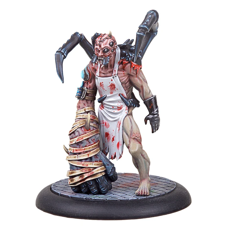painted miniature monster man with spider eyes and legs