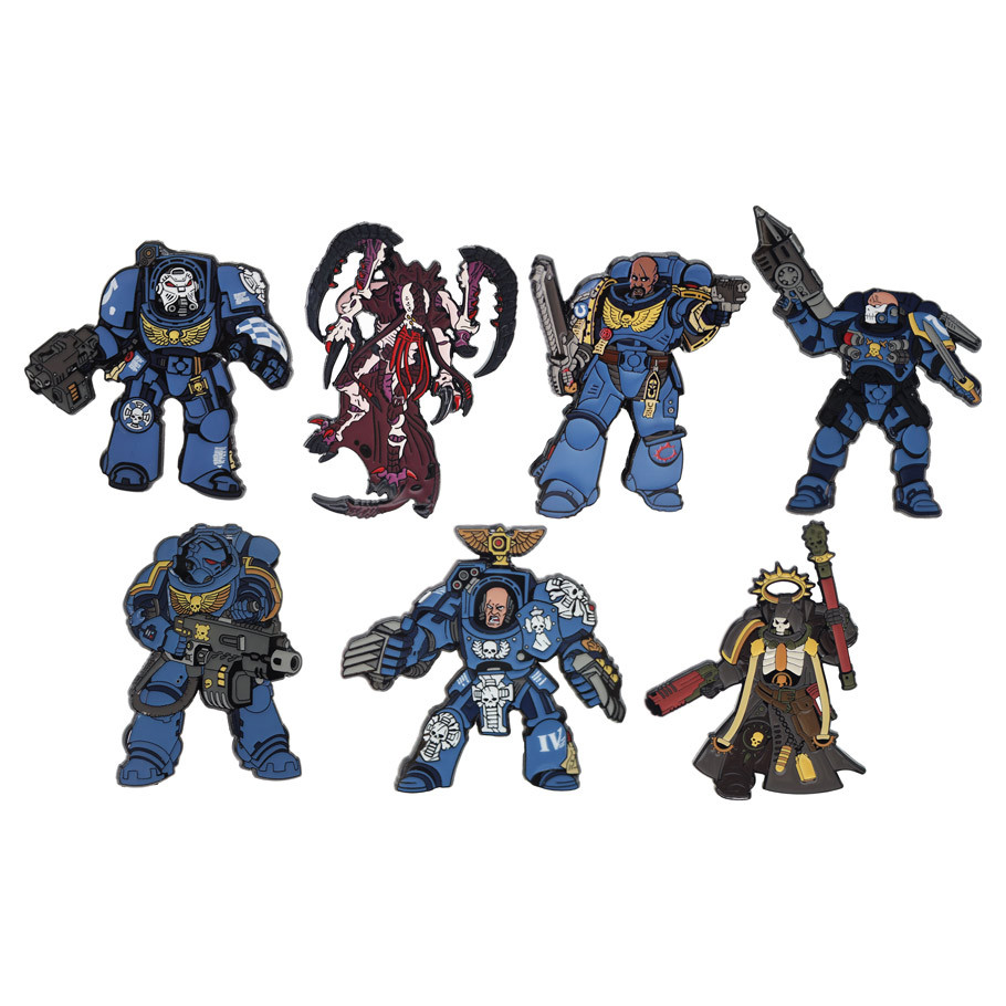 seven enamel pins featuring one tyranid and six space marines