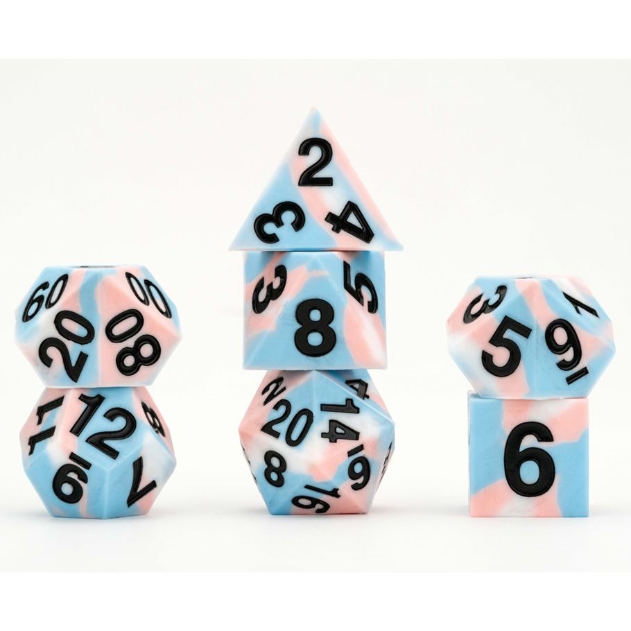 seven pink, white, and blue dice