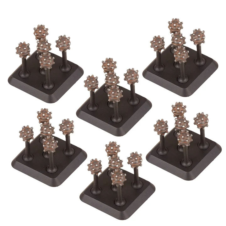 six bases of painted round mines