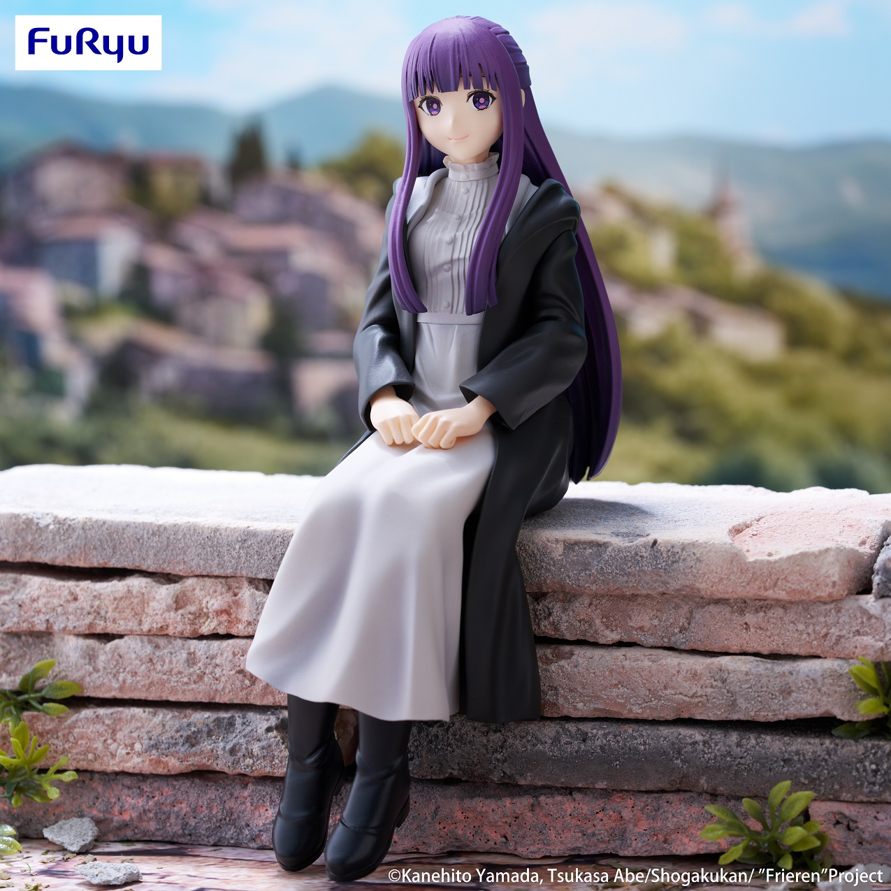 statuette of sitting character fern from anime frieren