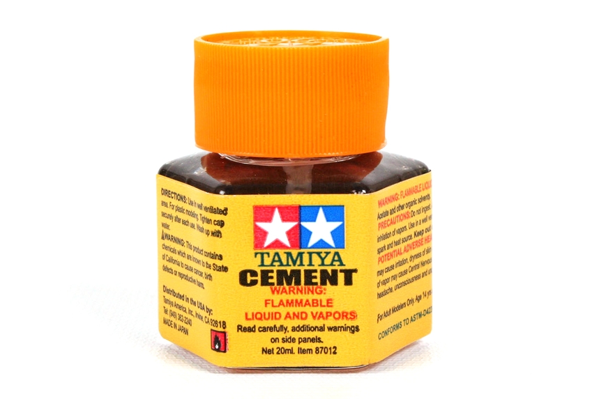 tamiya cement hexagonal glass bottle with orange lid
