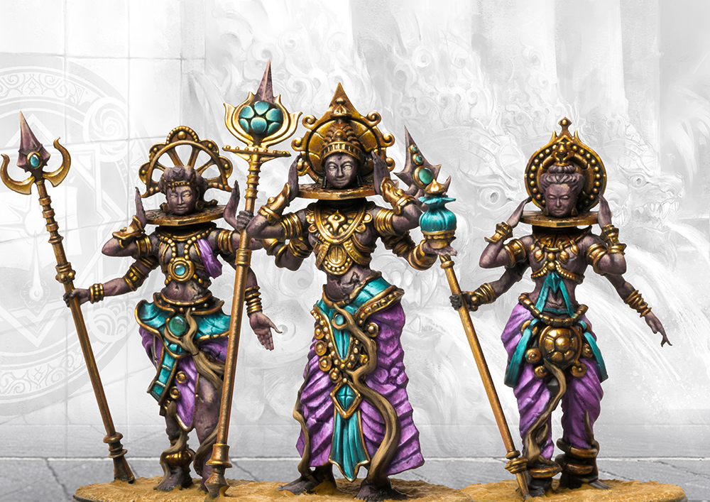 three painted miniatures of four armed women with scepters