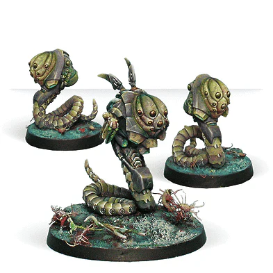 three painted worm alien miniatures
