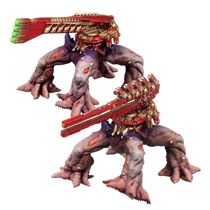 two painted miniatures of four fleshy legs with a turret on the joint