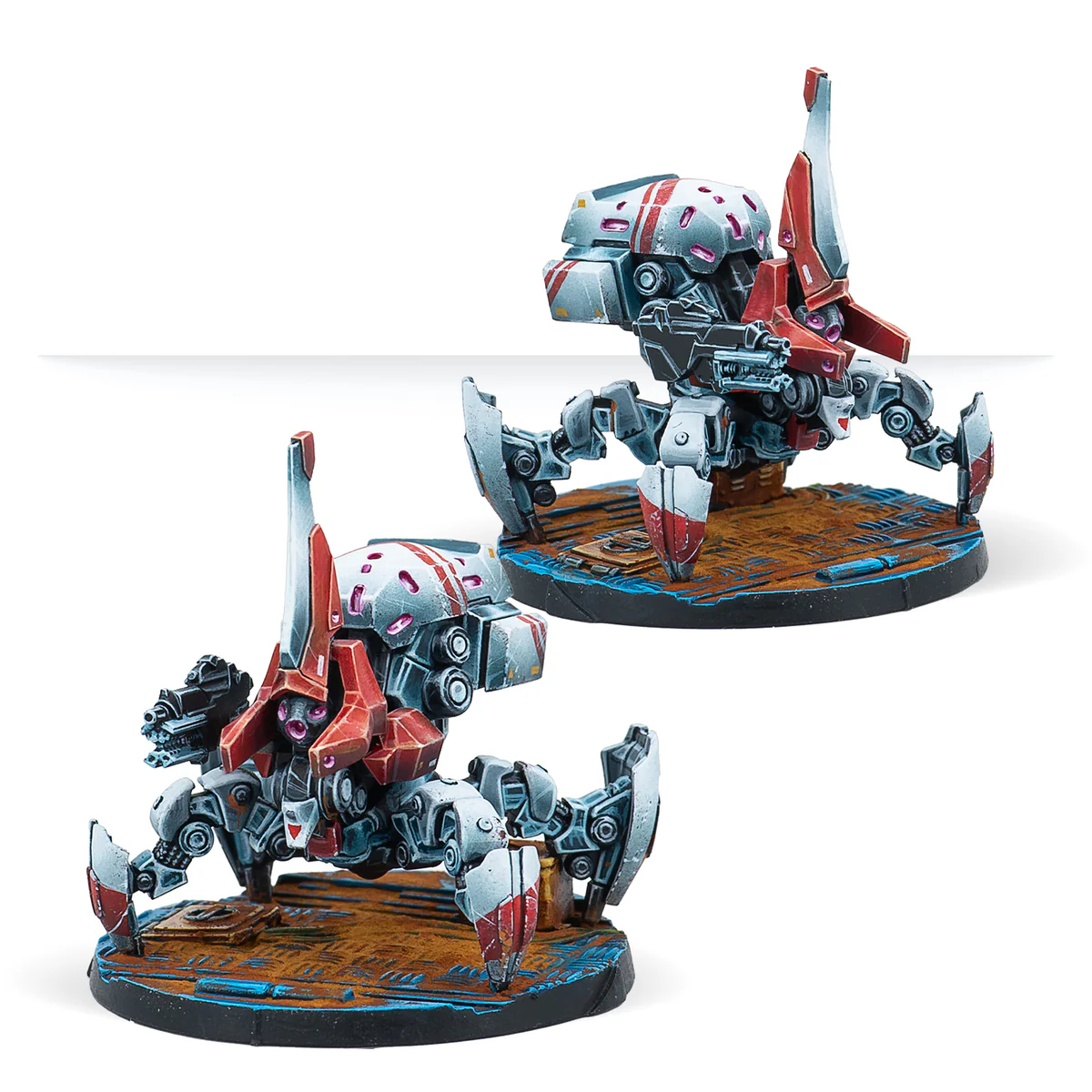 two painted red and white robots