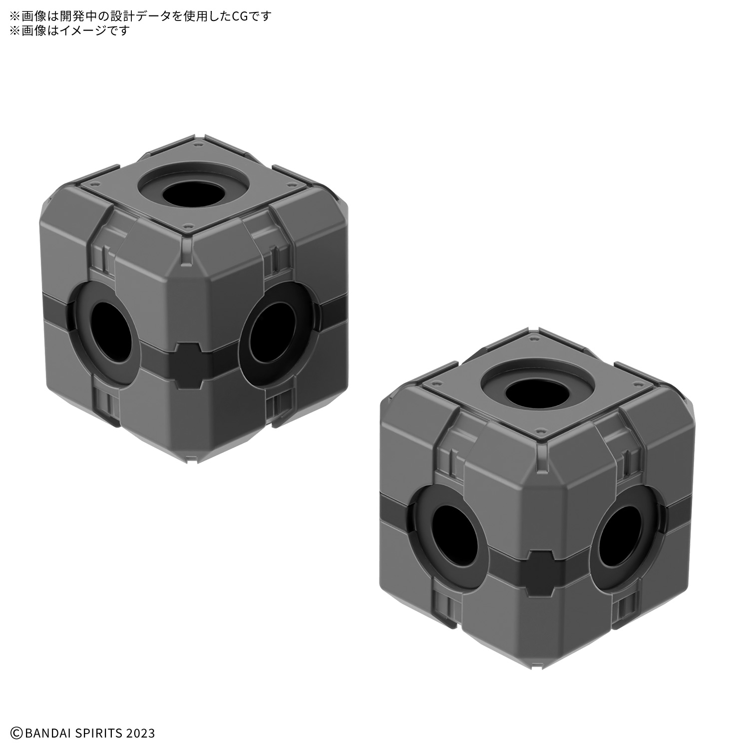 two small cubes with holes in each face